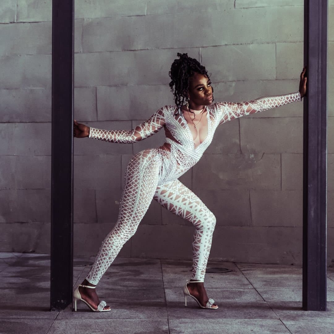 Portrait of Milaila Capote — professional Cuban dance instructor mid-performance